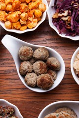 Nutrition concept - Healthy meals in white bowls over wooden background. Healthy food, Diet, Detox, Clean Eating or Vegetarian concept. Top view sets.
