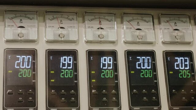 Close up of dash panel of working machin for recycling plastic waste