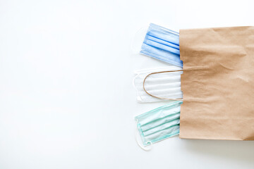 face masks in the paper bag  on white background