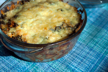 Potato casserole with cheese in pots