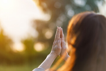 A woman prays .