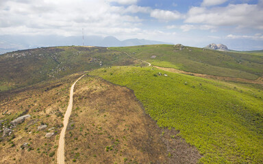 Cape Town, Western Cape / South Africa - 02/05/2020: Aerial photo of Paarl Rock and trails