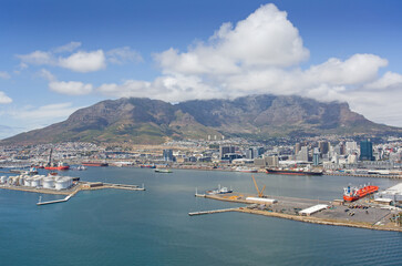 Cape Town, Western Cape / South Africa - 02/05/2020: Aerial photo of vessels at Table Bay Harbour with Table Mountain in the background