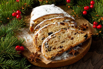 Fototapeta na wymiar Traditional homemade stollen with dried fruits and nuts