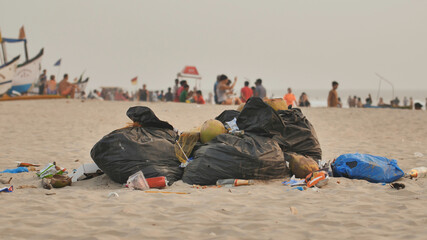 Pile of garbage on arambol beach. India.