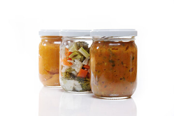Nutrition concept - Healthy meals in glass jars over white background. Healthy take-away lunch jar. 