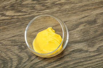 Natural cheese sauce in the bowl