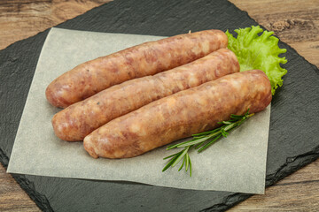Raw pork meat sausages for grill