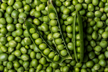 Fresh young  green peeled peas background