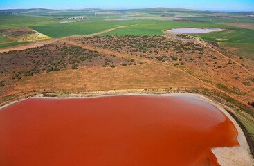 Cape Town, Western Cape / South Africa - 08/17/2017: Aerial photo of a red dam