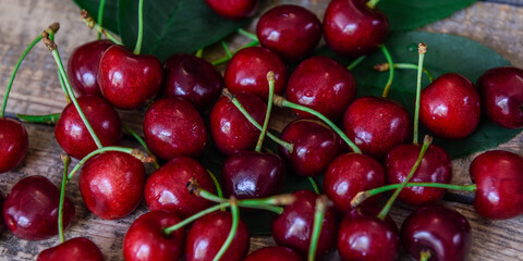 Background of red ripe cherries. Sweet ripe berry. View from above. Close-up