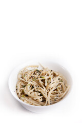 Nutrition concept - Healthy food, Diet, Detox, Clean Eating or Vegetarian concept. Healthy pasta in a white bowl over white background