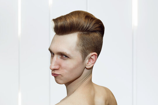 Young ginger guy with pompadour haircut, real photo hair for barbershop old fashioned