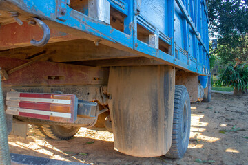 Blue truck used for transport of livestock between farms