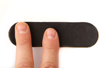 fingers with fingerboard on white background