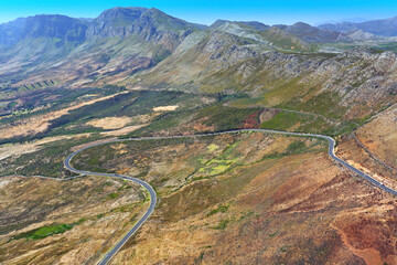 Cape Town, Western Cape / South Africa - 03/19/2018: Aerial photo of Sir Lowrys Pass and surrounding mountains © Grant Duncan-Smith