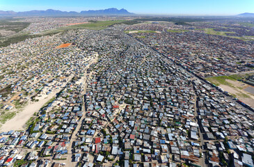 Cape Town, Western Cape / South Africa - 06/06/2018: Aerial photo of Khayelitsha township with Table Mountain in the background
