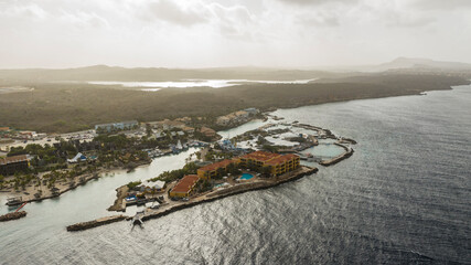 Aerial view of coast of Curaçao in the Caribbean Sea with turquoise water, cliff, beach and...