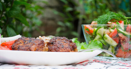 Cutlets with buckwheat porridge and salad. Healthy eating concept. Macro photo. Top view and side view. Erupny plan of the dish.