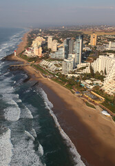 Durban, Kwa-Zulu Natal / South Africa - 06/12/2010: Aerial photo of Umhlanga beachfront and lighthouse with Durban in the background