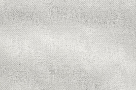 primed canvas texture, linen covered with white paint, a clean basis for the picture, a new canvas for creativity