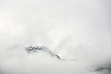 Kazbegi mountains covered with clouds, Georgia