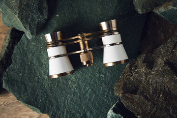 binoculars on the stones