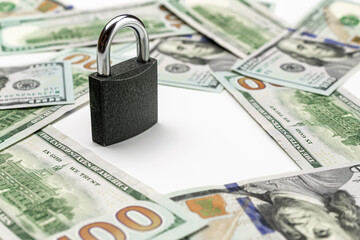 Money saved. American money. Washington American cash with padlock isolated on white, usd background