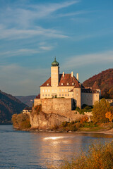 Fototapeta na wymiar Small castle Schonbuhel above the Danube in the romantic sunset, Austria