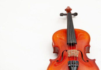 Fototapeta na wymiar Violin closeup on white background
