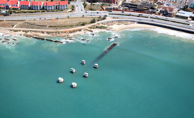 Fototapeta na wymiar Port Elizabeth, Eastern Cape / South Africa - 01/29/2010: Aerial photo of Port Elizabeth jetty and beachfront