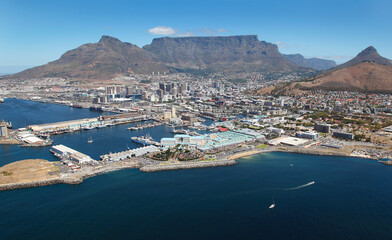 Naklejka premium Cape Town, Western Cape / South Africa - 02/08/2012: Aerial photo of Table Bay Hotel and V&A Waterfront with Cape Town CBD and Table Mountain in the background
