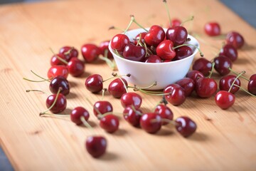 Red Cherries. pile of ripe cherries with stalks.