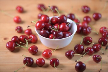 Red Cherries. pile of ripe cherries with stalks.