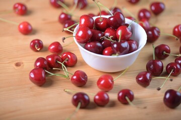 Red Cherries. pile of ripe cherries with stalks.