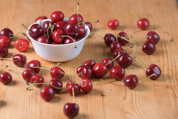 Red Cherries. pile of ripe cherries with stalks.