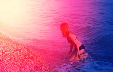 Printed kitchen splashbacks Candy pink Photo of a beautiful girl on a sea