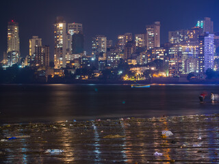 Fototapeta na wymiar Mumbai night skyline view from Marine Drive in Mumbai, India.