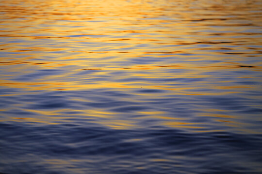 Beautiful photo background of sea waves at sunset