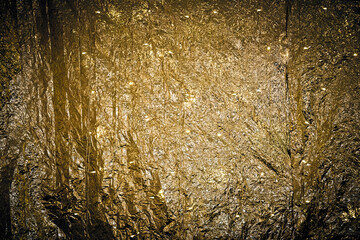 Metallic shiny texture background. Christmas golden backdrop