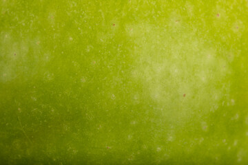 Apple skin surface texture pattern close up detail macro. Abstract background. 