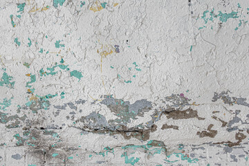 abstract background of an old shabby painted white wall close up