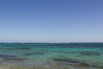 Obraz premium Blue and turquoise sea caught in the wind