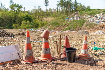 traffic cones thrown at the landfill