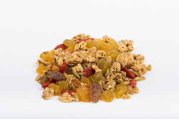 Top View Close up Mixture of granola or muesli on white background, dehydrated fruit mix, healthy food, almond, sun dried cultivated banana, cranberry, cashew nut, pumpkin, melon seed