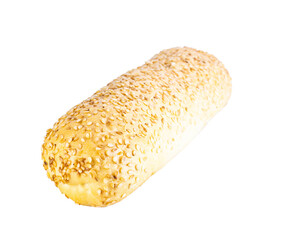 Appetizing baked golden bun with sesame seeds on white background