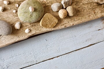 Flat lay image of stones and sea shells. Beach concept with copy space