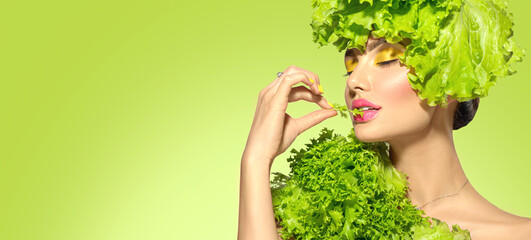 Healthy eating, diet. Beautiful healthy girl eating raw vegan food and smiling. Beauty young...