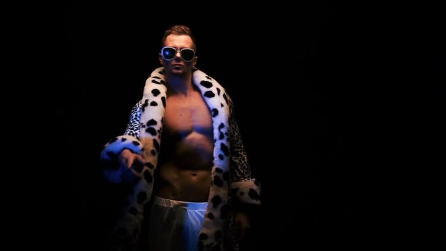 Glamorous guy dancing