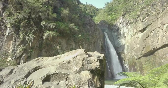 ascending drone footage waterfall landscape in Jarabacoa Dominican Republic .Jimenoa waterfall landscape an ecological touristic destination place